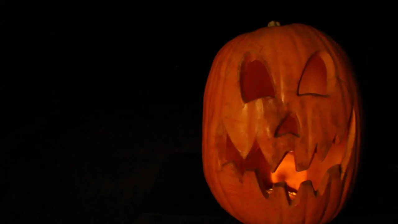 Tall Jack O Lantern With Flickering Pumpkin Light Halloween Framed Right Wide Angle Lens