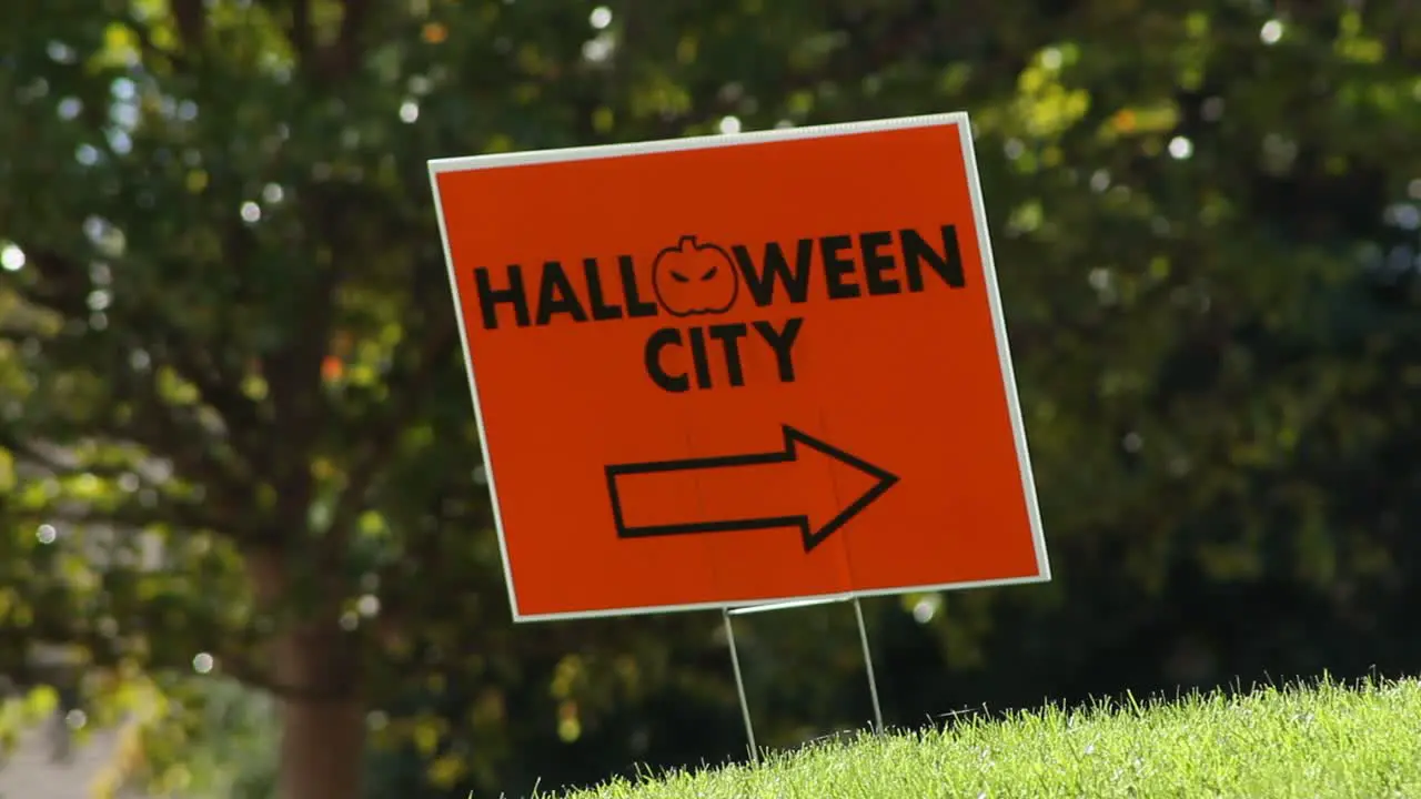 Halloween City Sign Blowing in the Wind No Cars