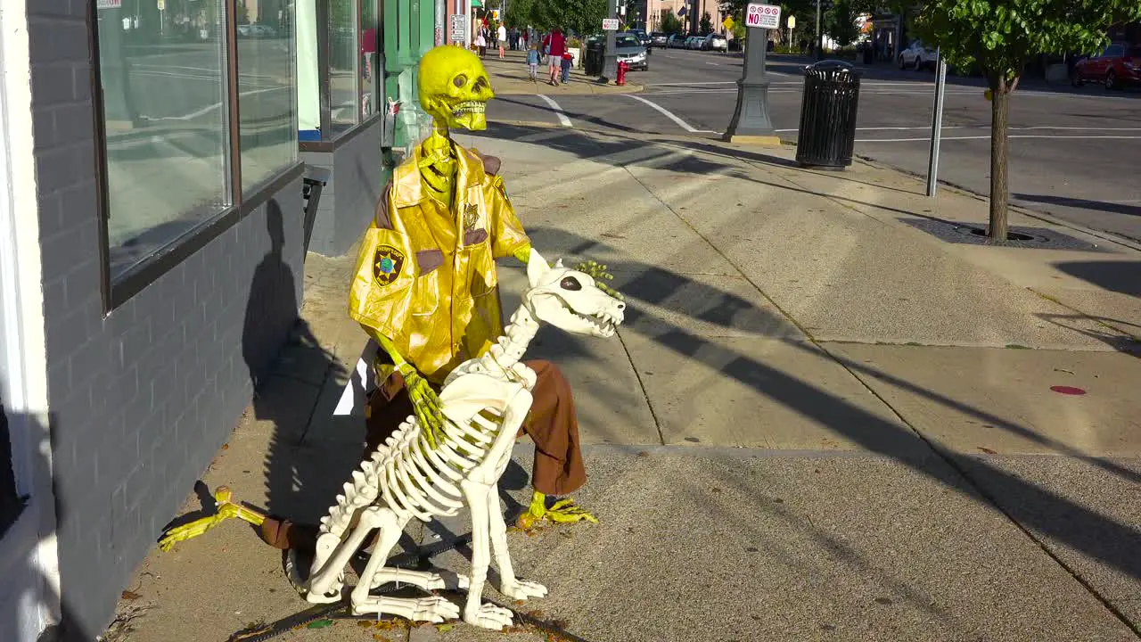 Halloween skeletons and decorations along main street America 3