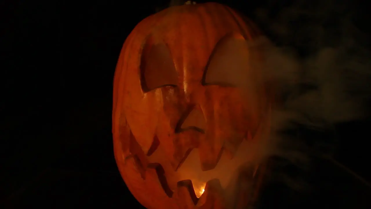 Smoking Tall Jack O Lantern With Flickering Pumpkin Light Halloween Centered Wide Angle Lens