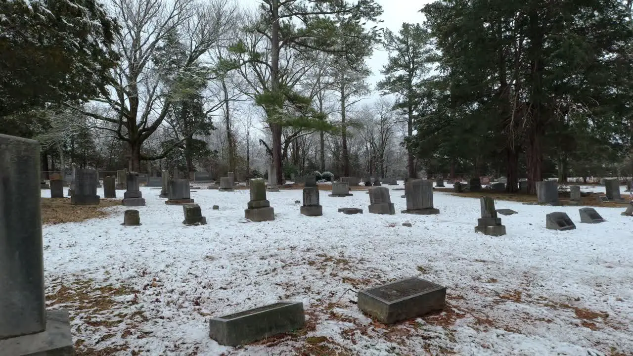 Drone Fly through Old Cemetery and tree in winter snow near Murfreesboro Tennessee