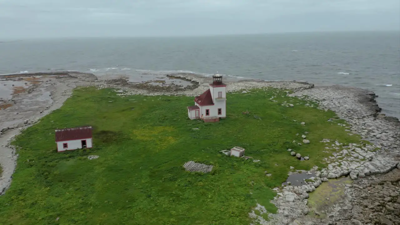 Abandoned Lighthouse on creepy Island Newfoundland Push In Drone Clip