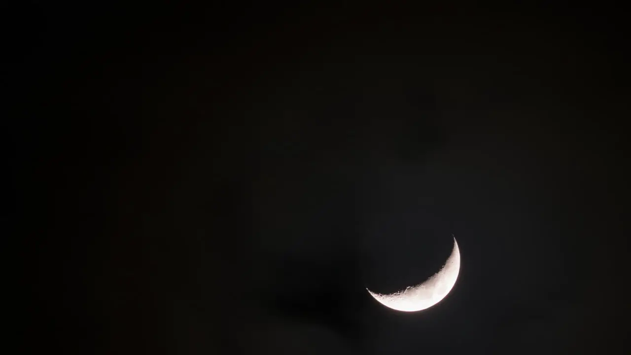 Timelapse of moving moon on night sky