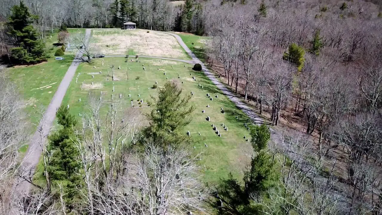 Aerial Graveyard from treetop level in 4k