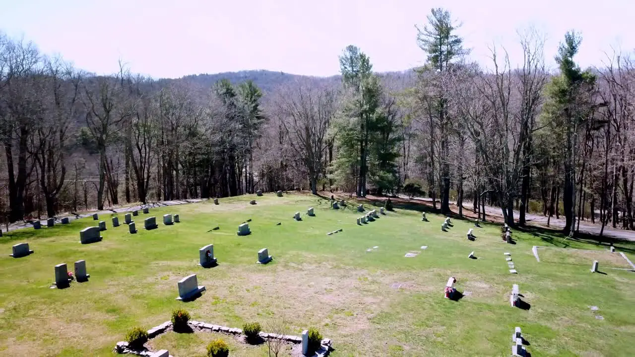 Aerial Pull Out Tombstones in Graveyard Cemetery