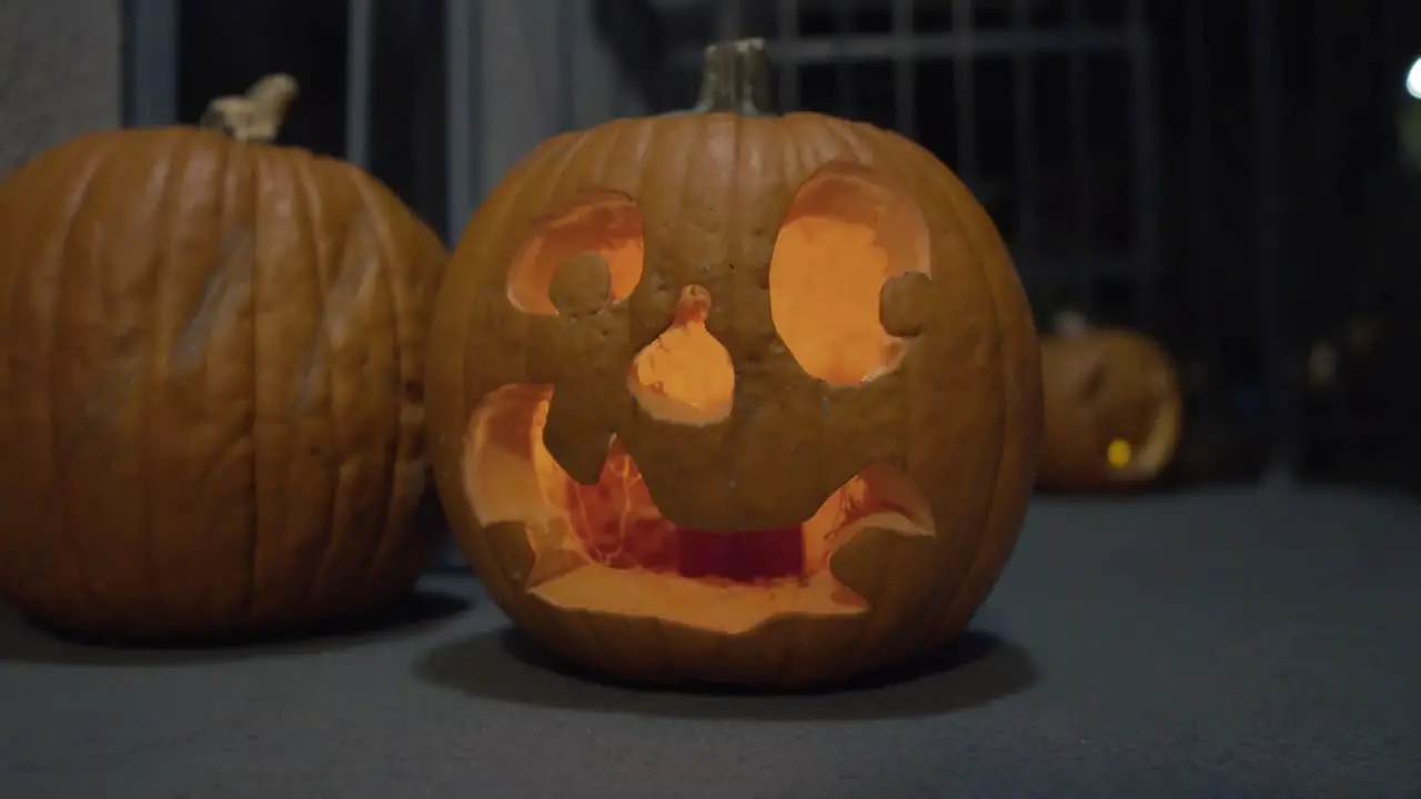 A Halloween Jack-O-Lantern on the front porch