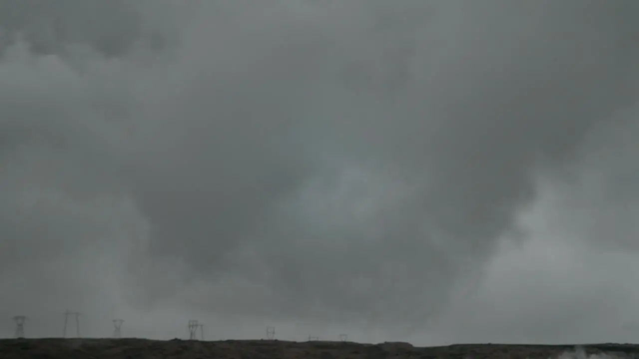 iceland power lines and smoking pipe camera movement camera pan from right to left