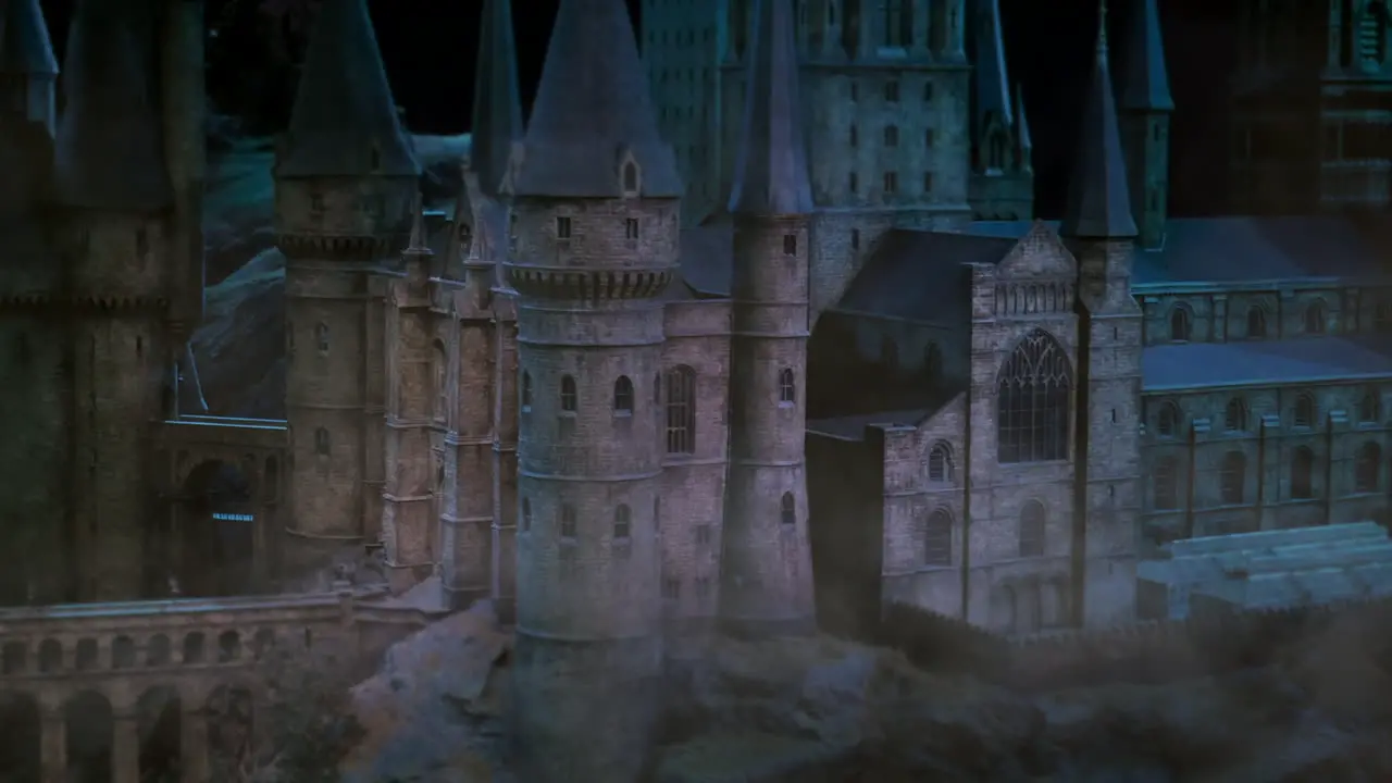 Misty Harry Potter Hogwarts school of witchcraft and wizardry gothic castle scene with birds and bats flying by