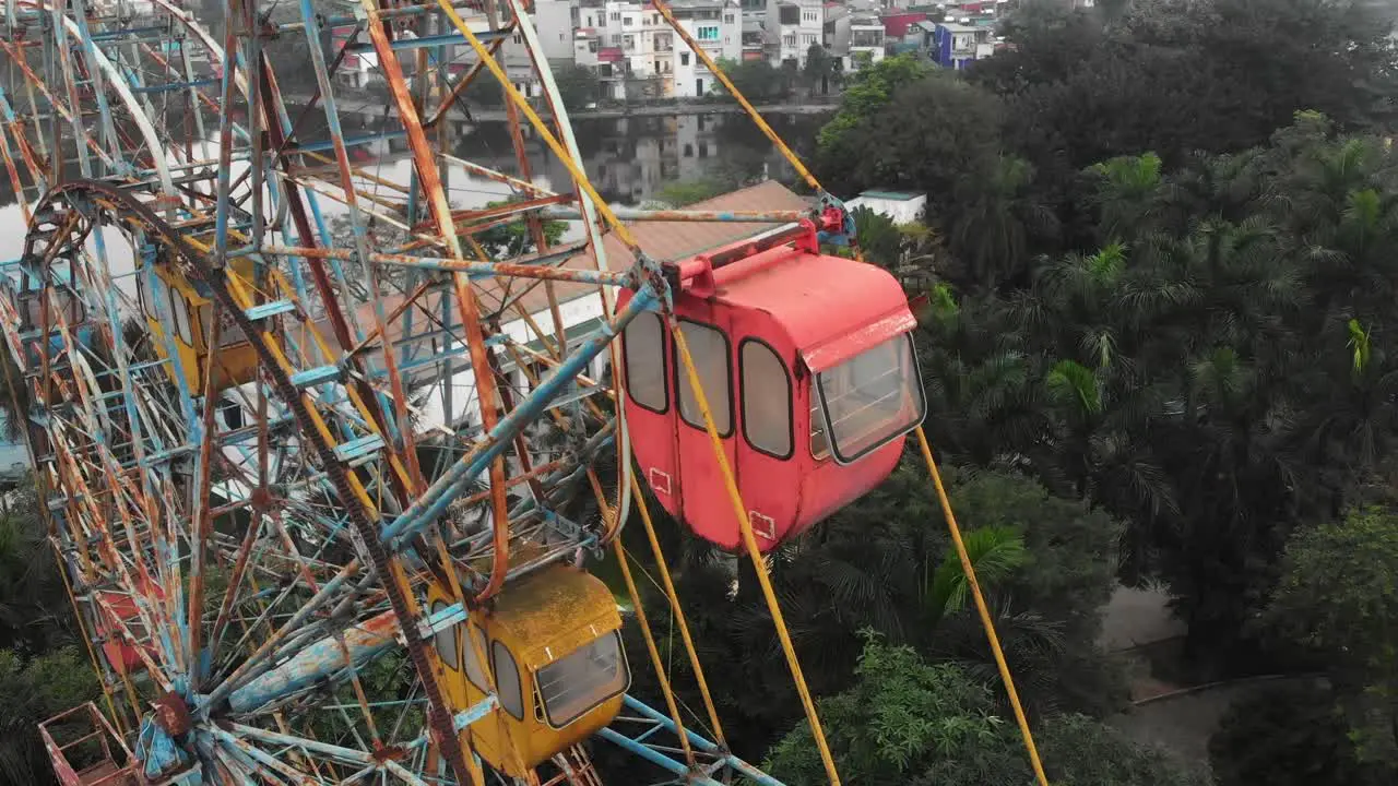 Aerial view of the abandoned Hanoi Ferris wheel under the radiant daylight an intriguing sight of a forgotten amusement towering over the city