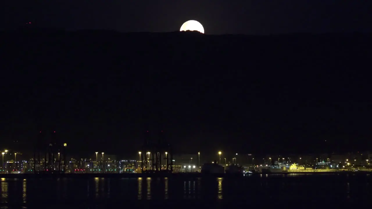 Gibraltar Moon Heading Under Cloud