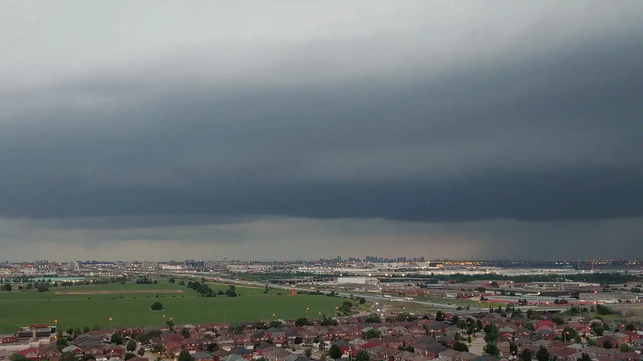 Dark clouds gather over a city are an ominous sign of an imminent thunder storm