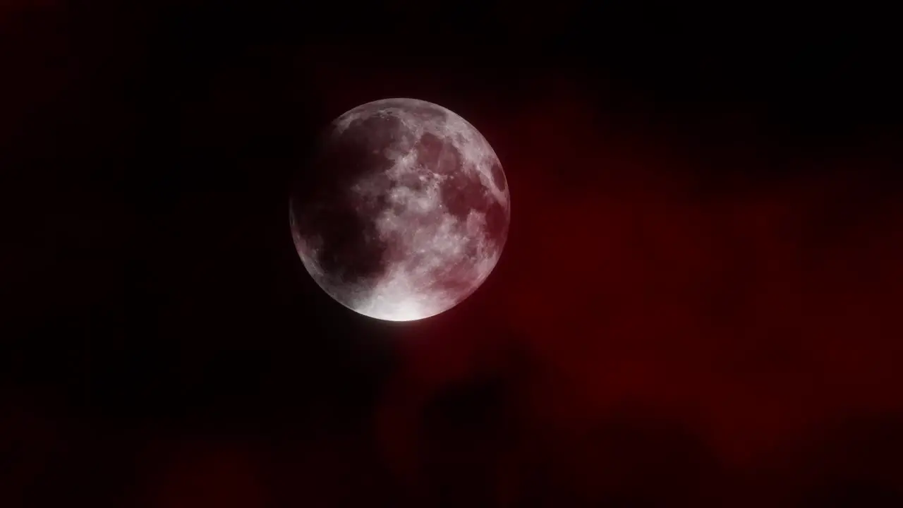 Blood moon rising through thick overcast red clouds haunted horror scene background