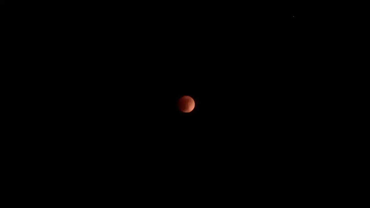 Super Blood Moon in Dark Night Sky