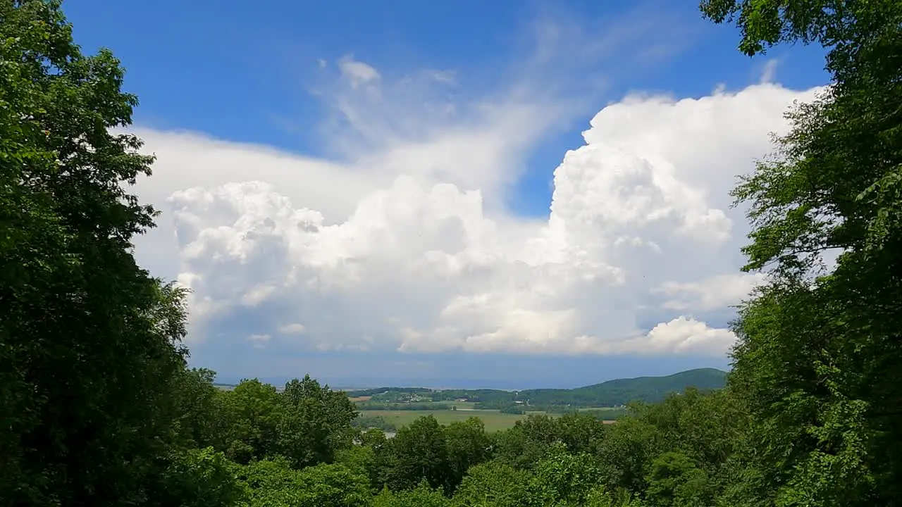 A time-lapse of a thunderstorm building over the landscape