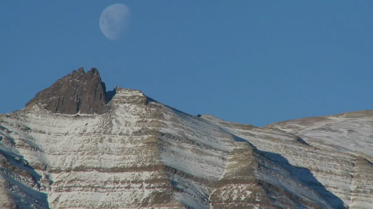 A full moon rises over the Andes mountains in Patagonia 1