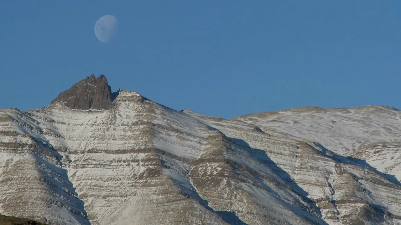 A full moon rises over the Andes mountains in Patagonia 3