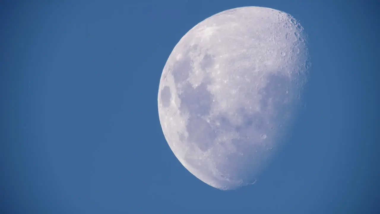 Half moon in the blue sky