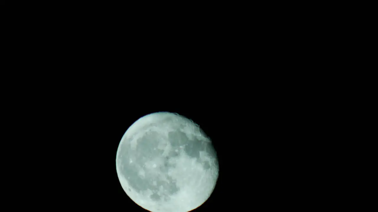 Moon panning across night sky