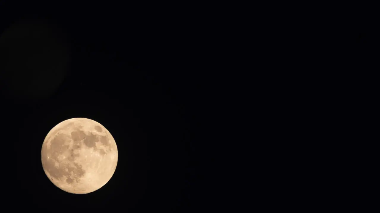 Time lapse of a full moon rising in the Northern Hemisphere seen fro England