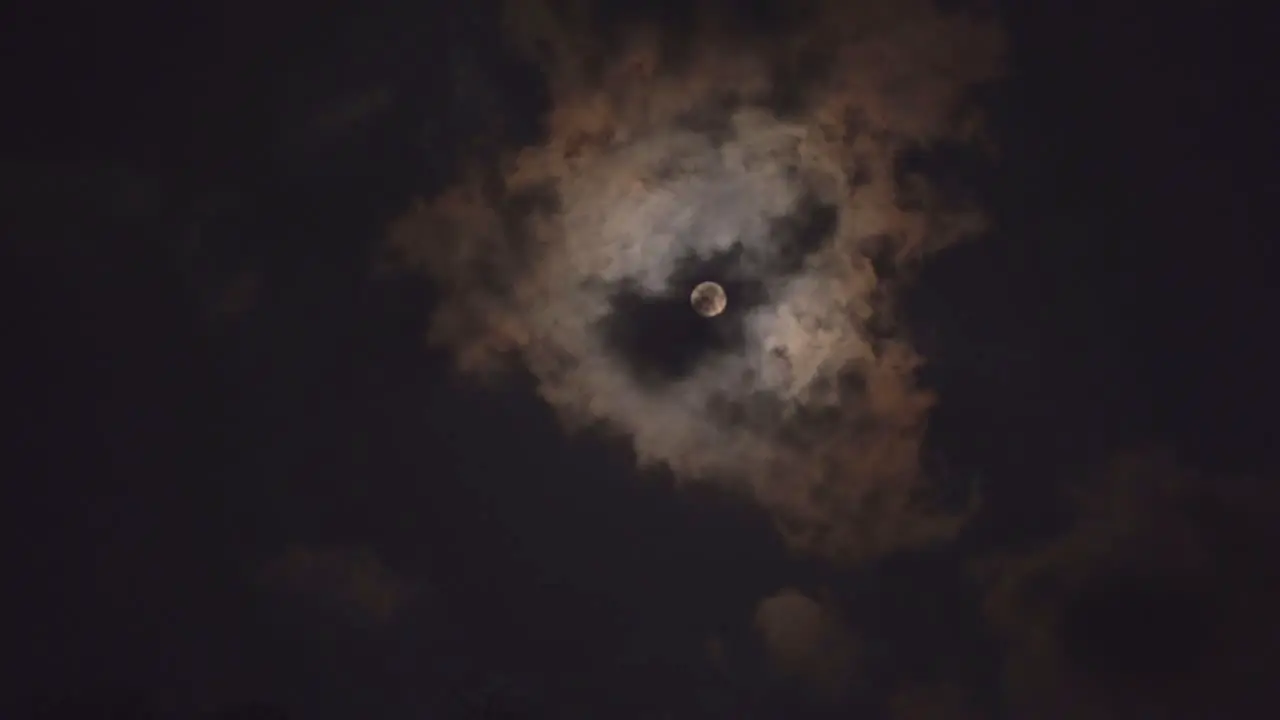 Clouds over full moon Clouds moving fast