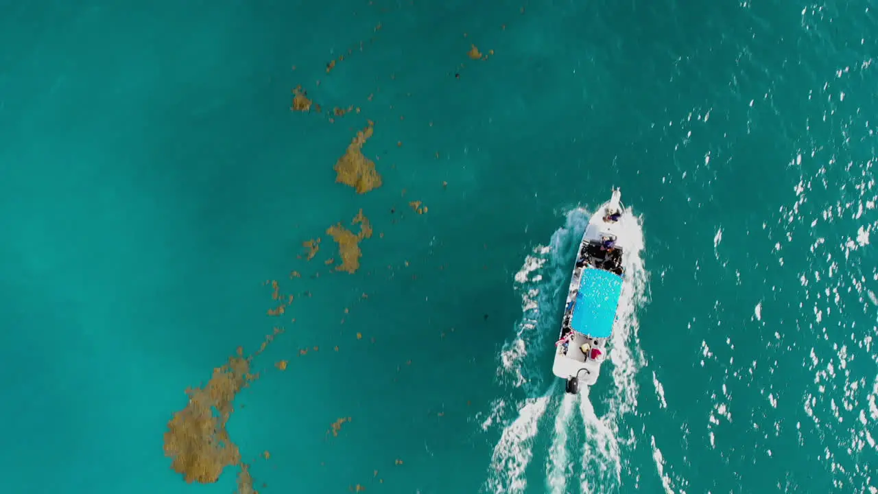 Diving boat sailing out on Mexico ocean drone shot