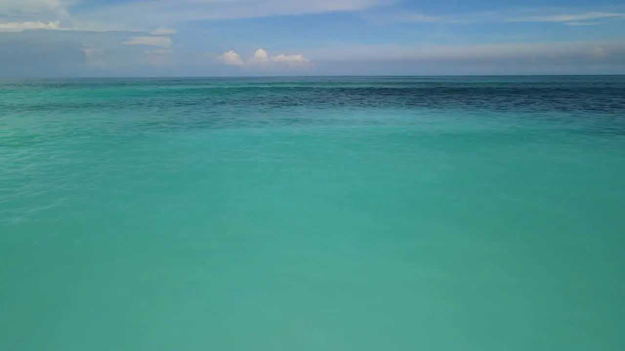 Beautiful ocean wave's in the white sand beach Indonesia