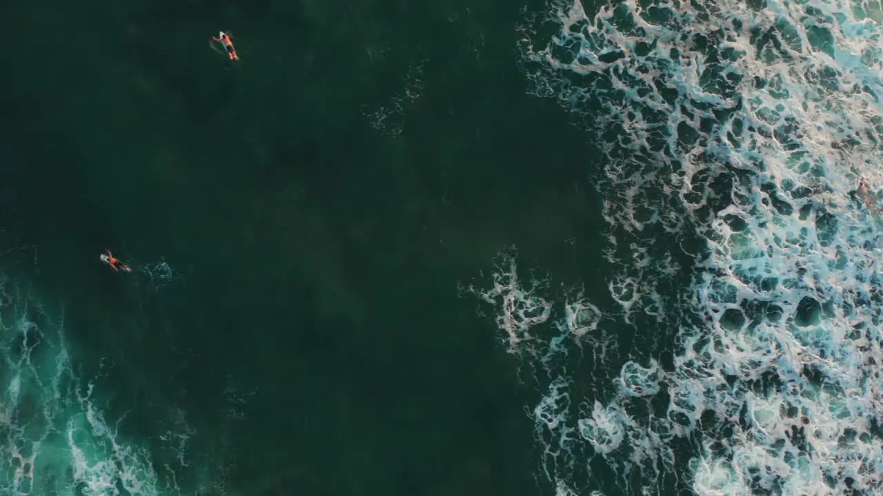 Top down view of surfers at Canggu