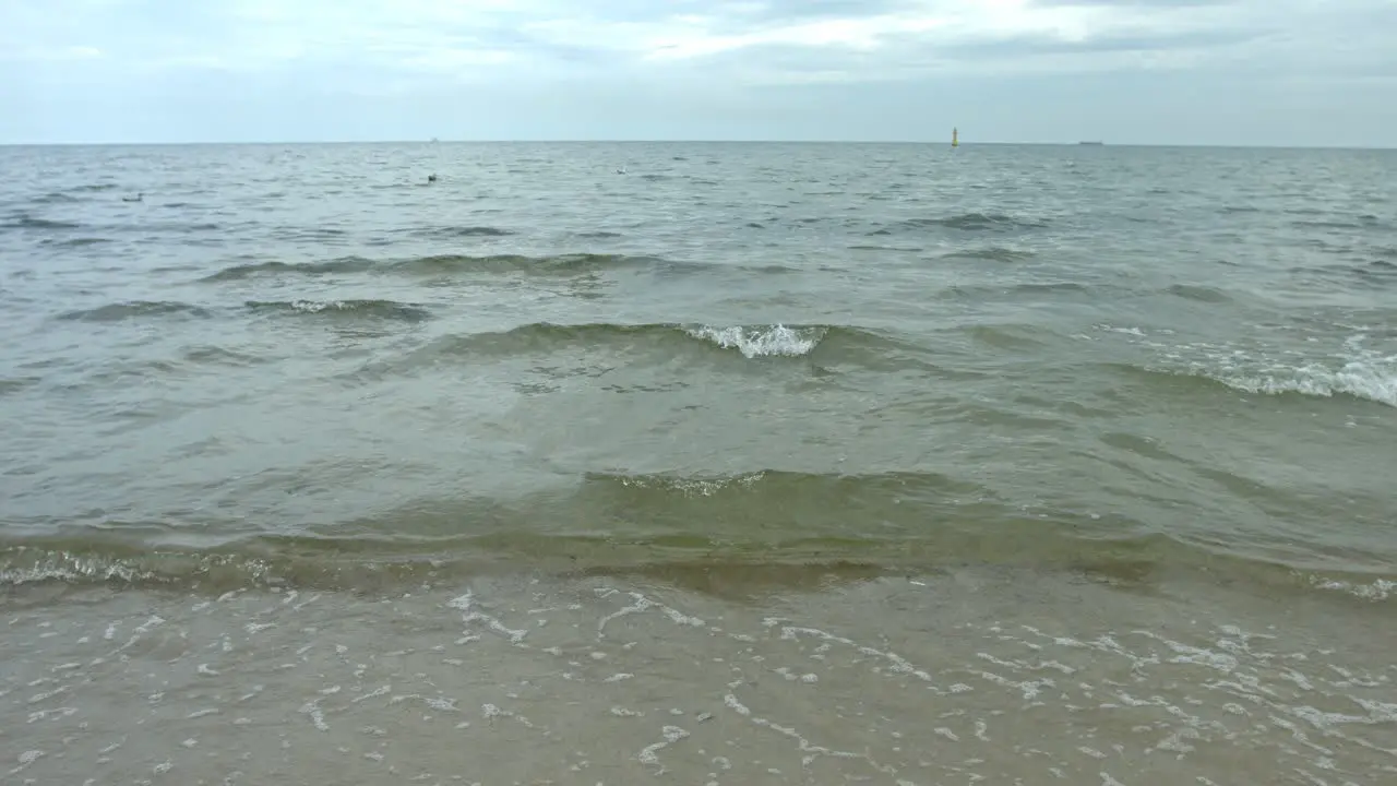 A female enjoying running in the water