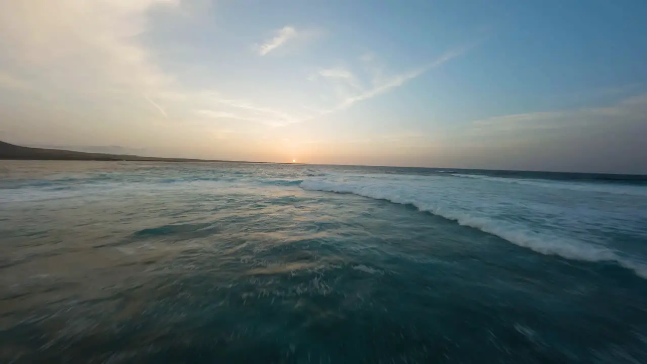 fuerteventura fpv north coast waves during beautiful sunset slowmotion 50fs