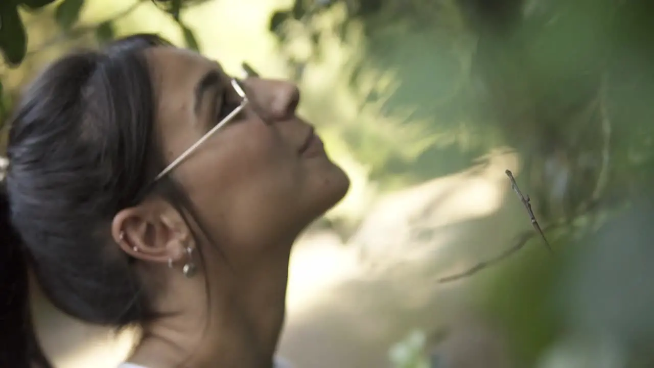 Slowmotion shot of a young woman admiring the nature surrounding her