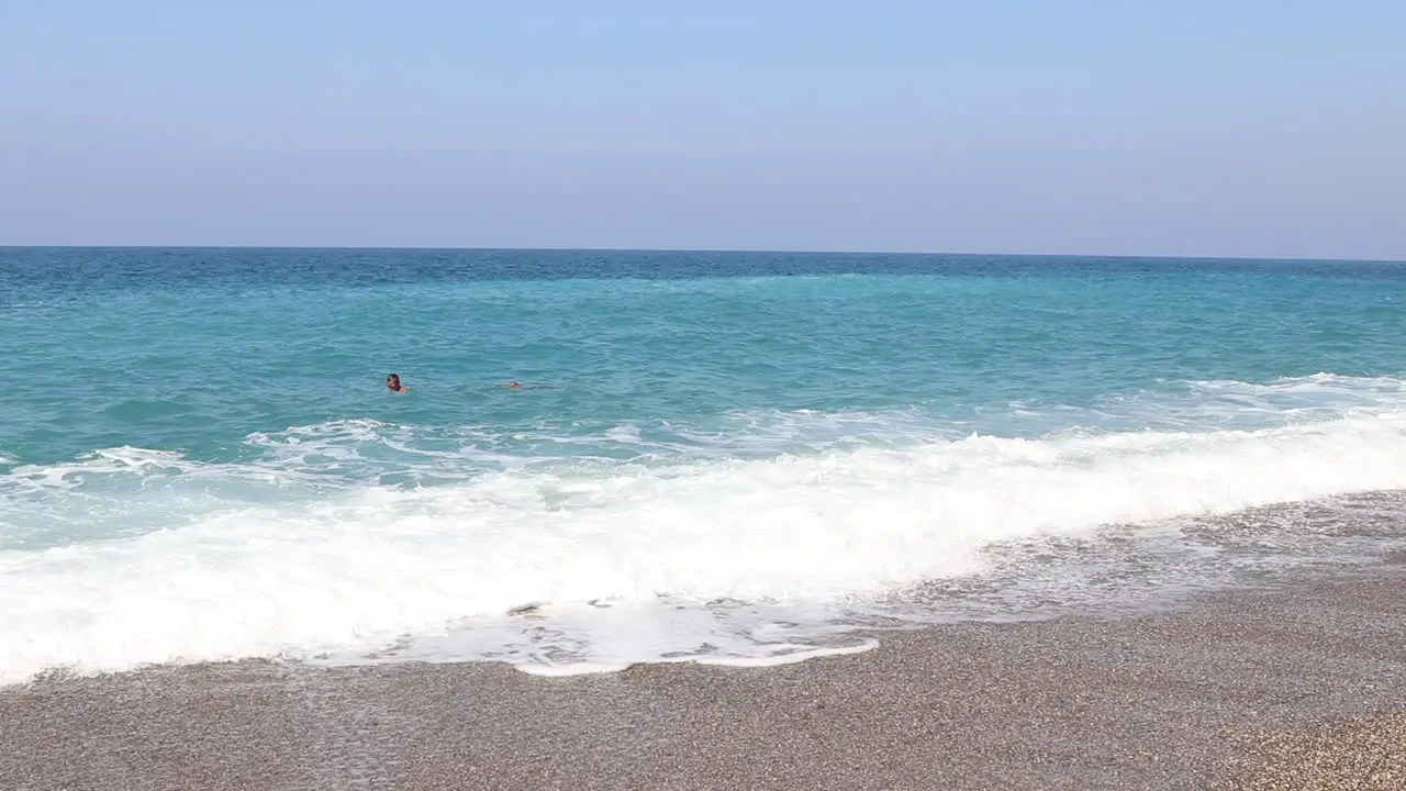 Two Men Swim With Mask And Snorkel