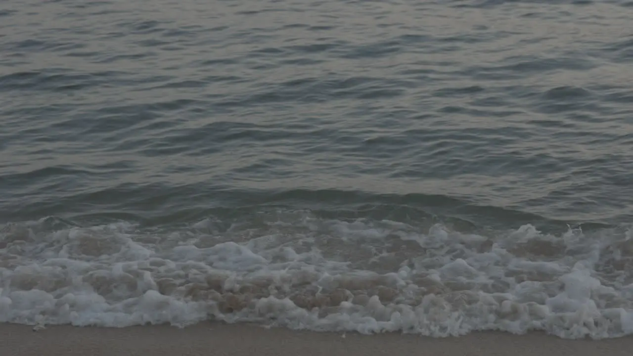 ocean waves by coastline in slow motion