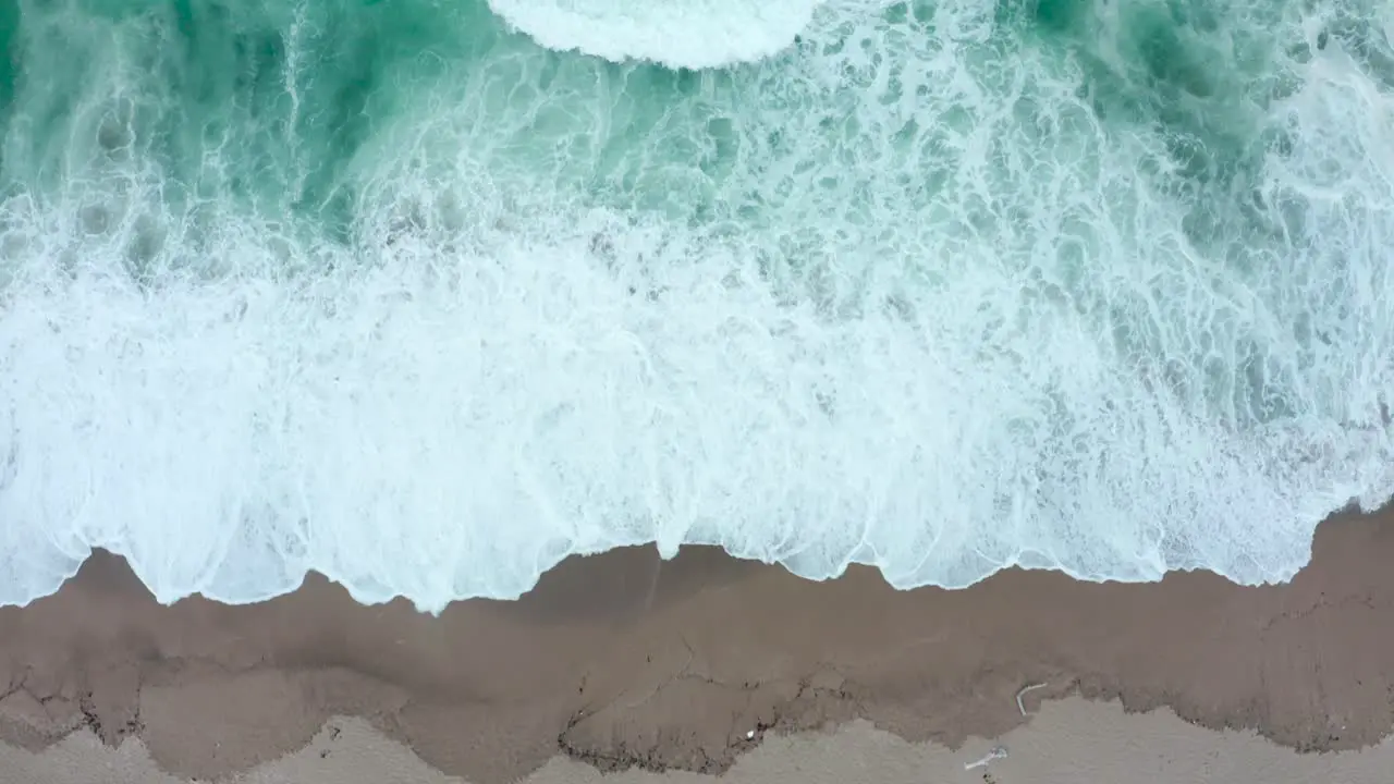 Top view of big sea waves during a cloudy day