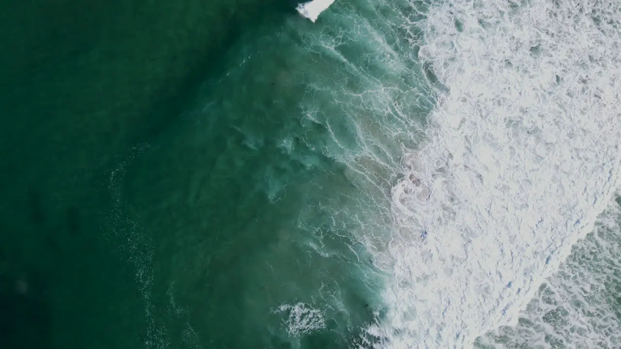 Beautiful textures created by waves rolling onto sandy shore