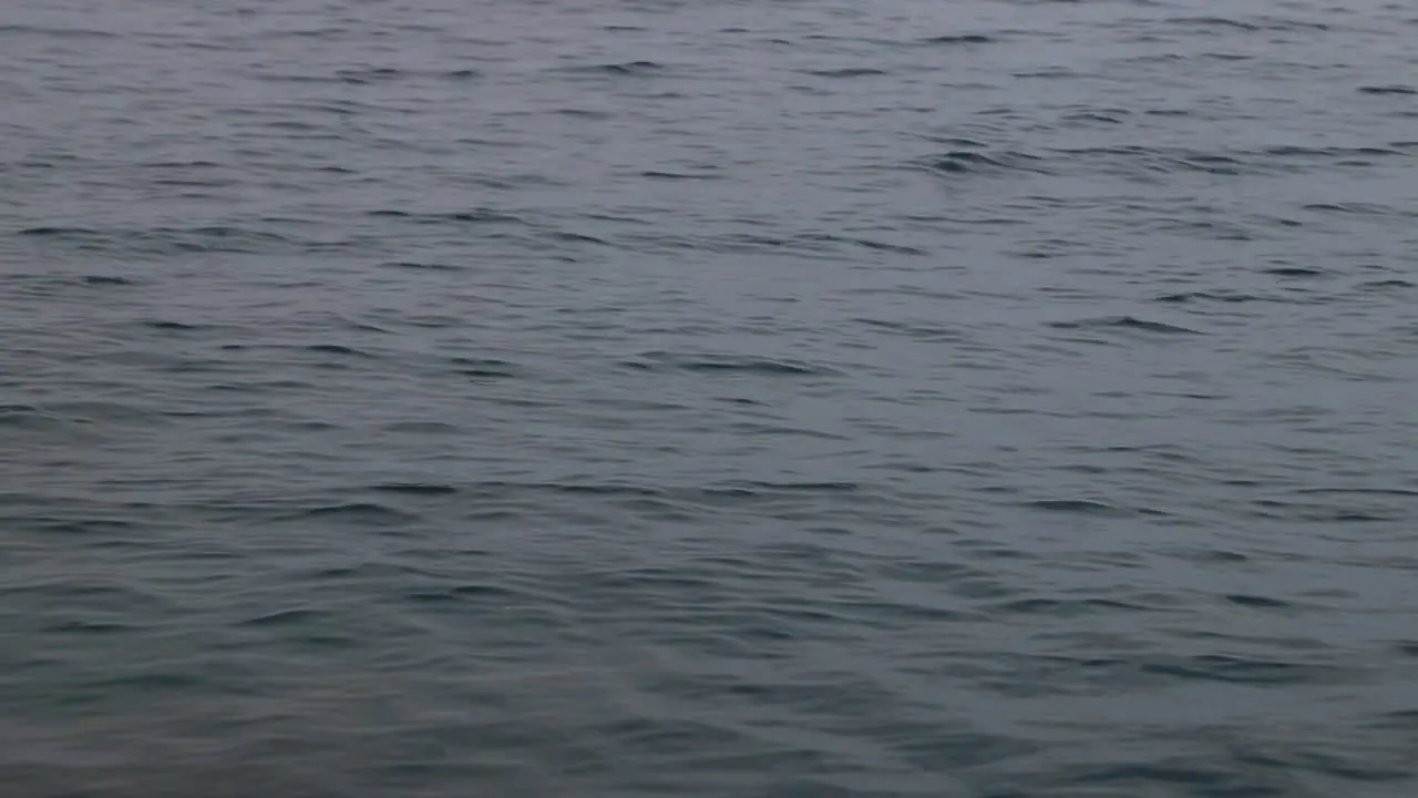 Sea surface in slow motion on a cloudy day