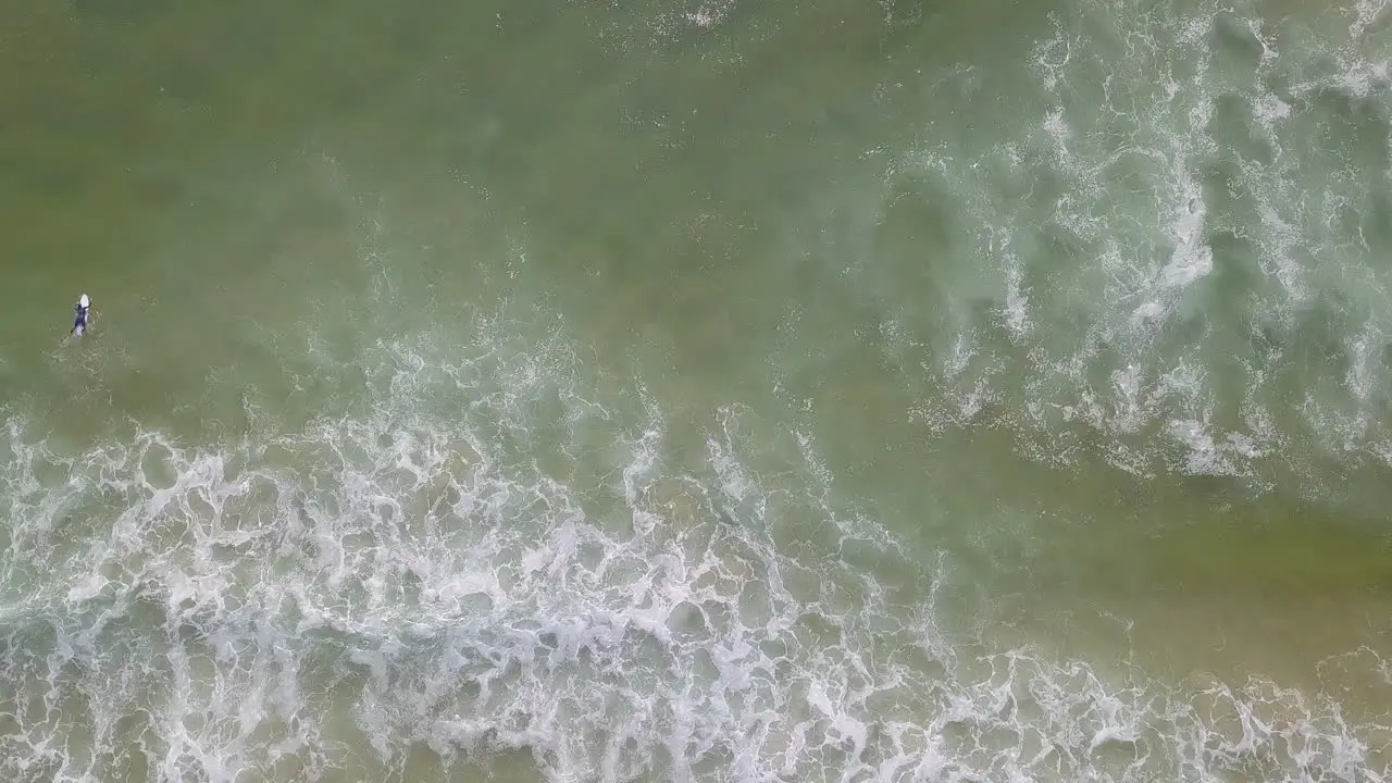 Aerial of exotic beach in South Africa with waves and sand