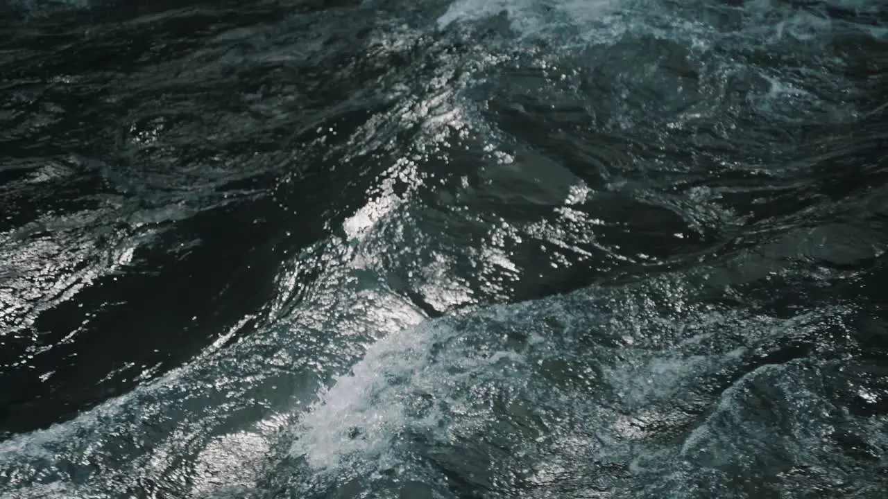 Slow-motion shot of water flowing in a river in Baños de agua santa Ecuador