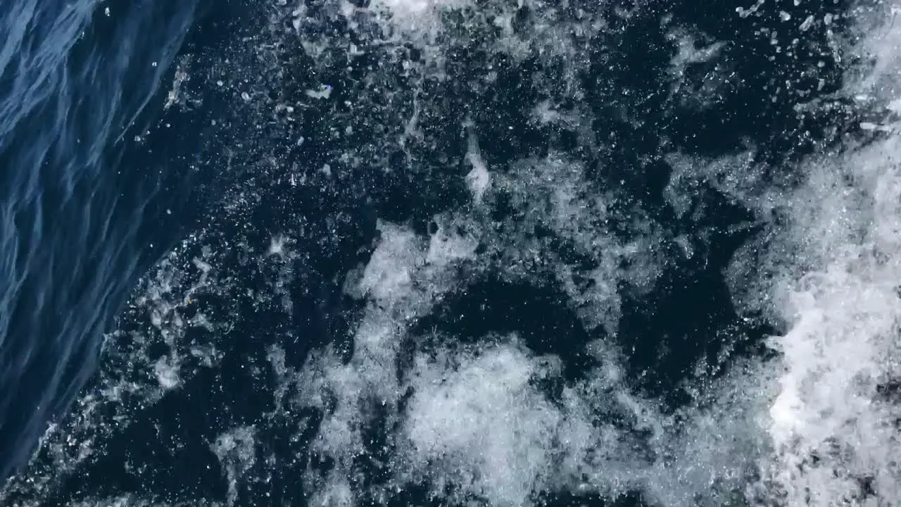 Close up overhead view of wake of a boat as it speeds along