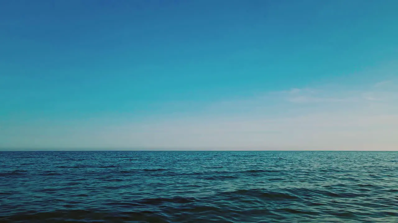 Ocean waves with a clear blue sky