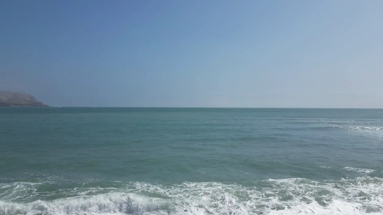 Aerial dolly shot of the beach in miraflores