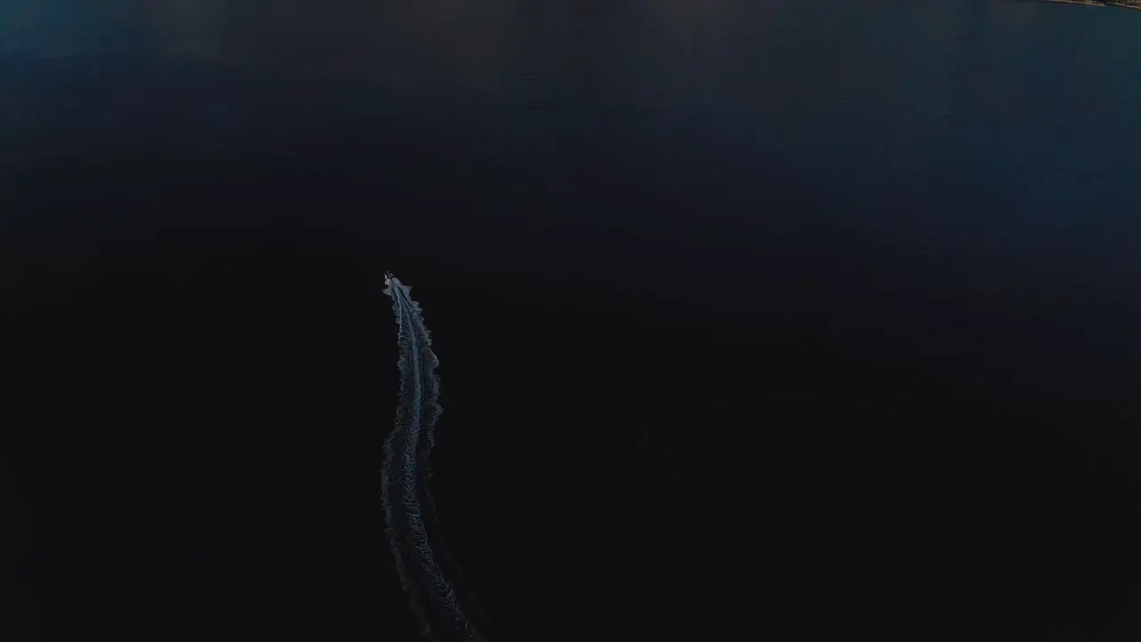 Aerial drone shot of the speed boat drifting on the ocean 9