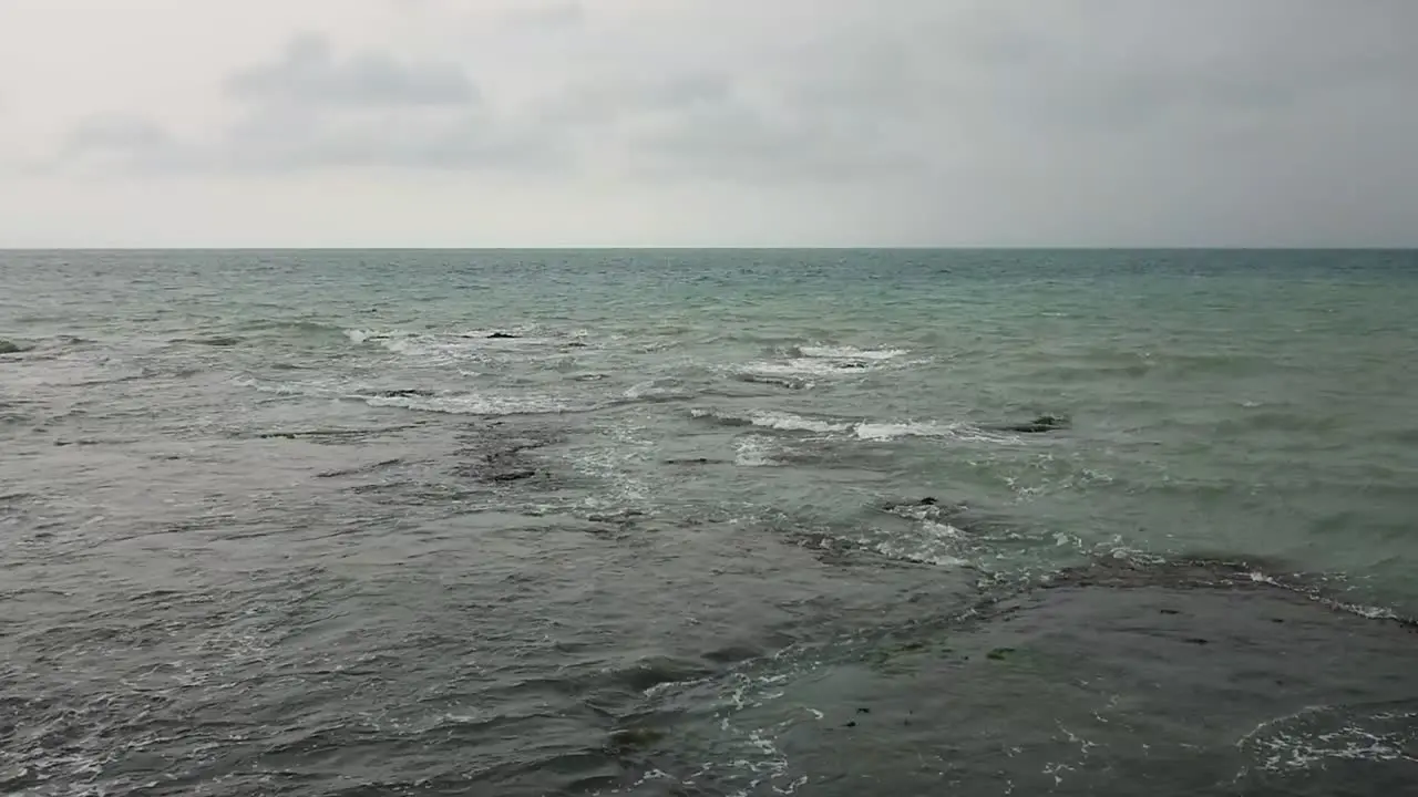 Water surface texture waves on the beach