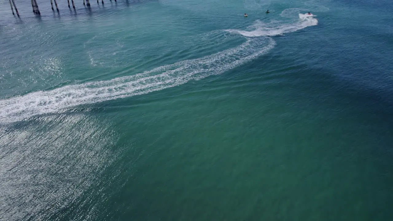 Jet Skiers And Surfers Having Fun At Letitia Beach On A Sunny Summer Day Tweed Sand Bypass NSW Australia