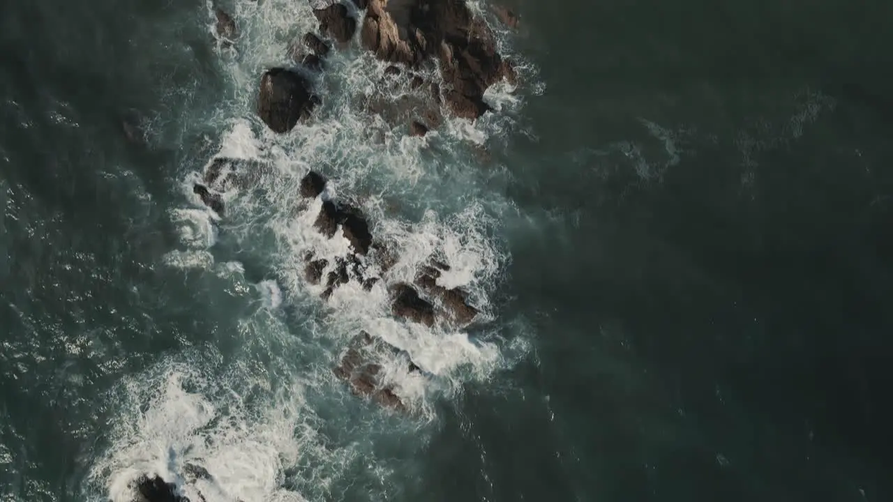 Aerial birds eye view of rocky coastline