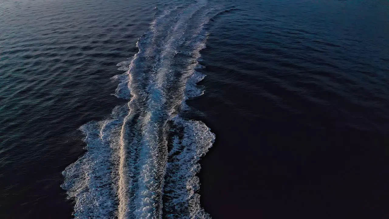 Aerial drone shot of the speed boat drifting on the ocean 8