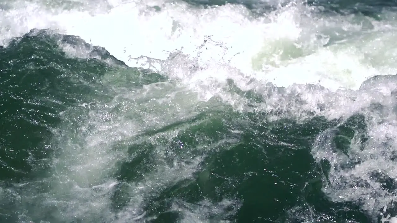 Wild waves at a fast rapids