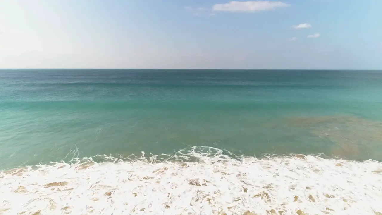 Aerial view over vast sea and horizon on Spanish beach in Los Canos de Meca