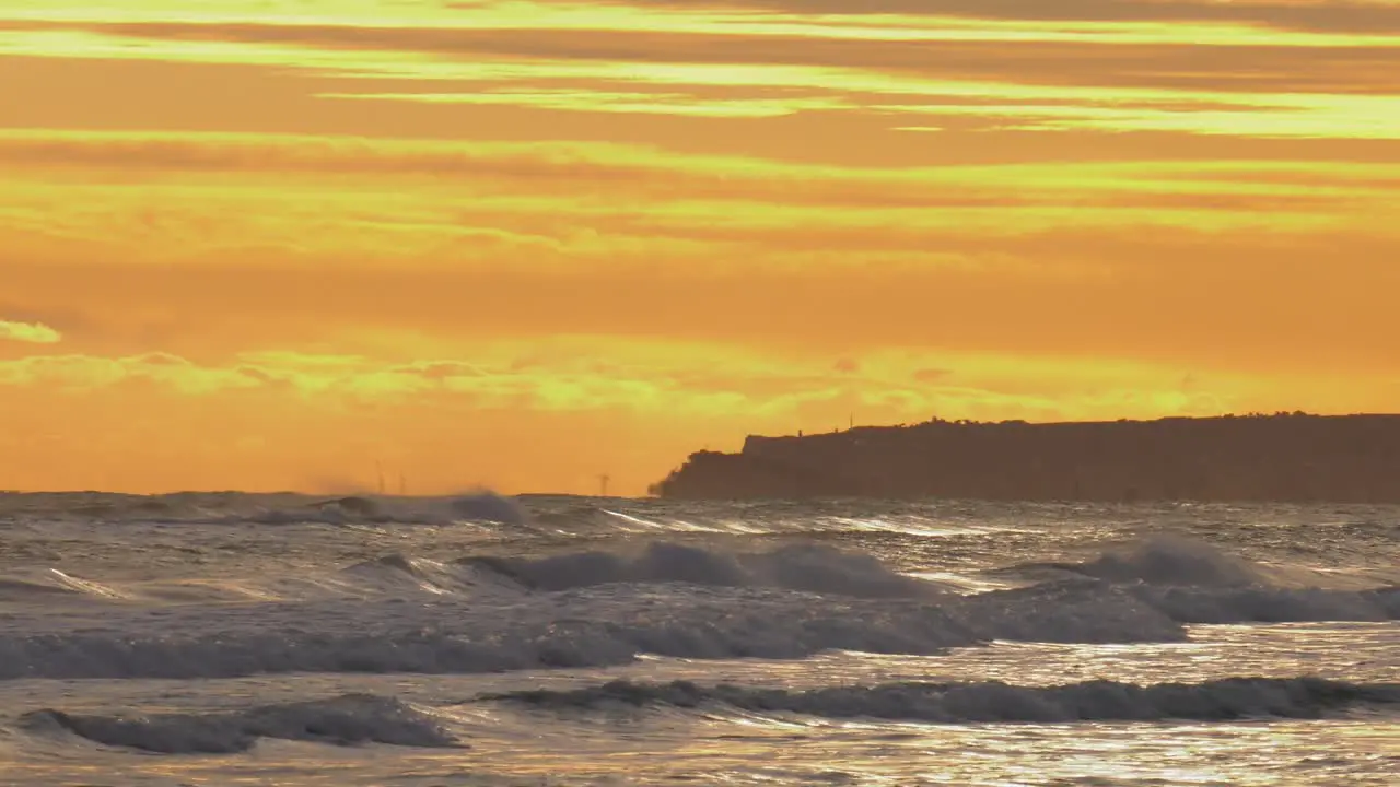 rough seas at dawn beach view