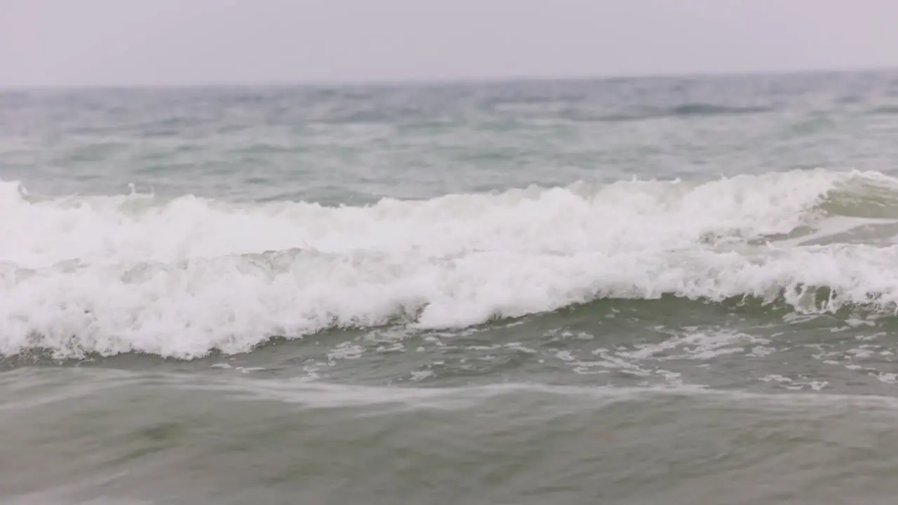 Stormy Waves Crashes Over The Shore At Tropical Beach