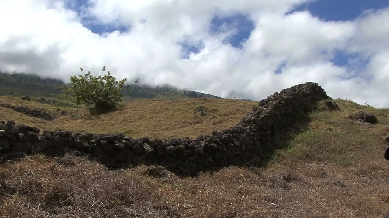 Maui Stone wall and clouds